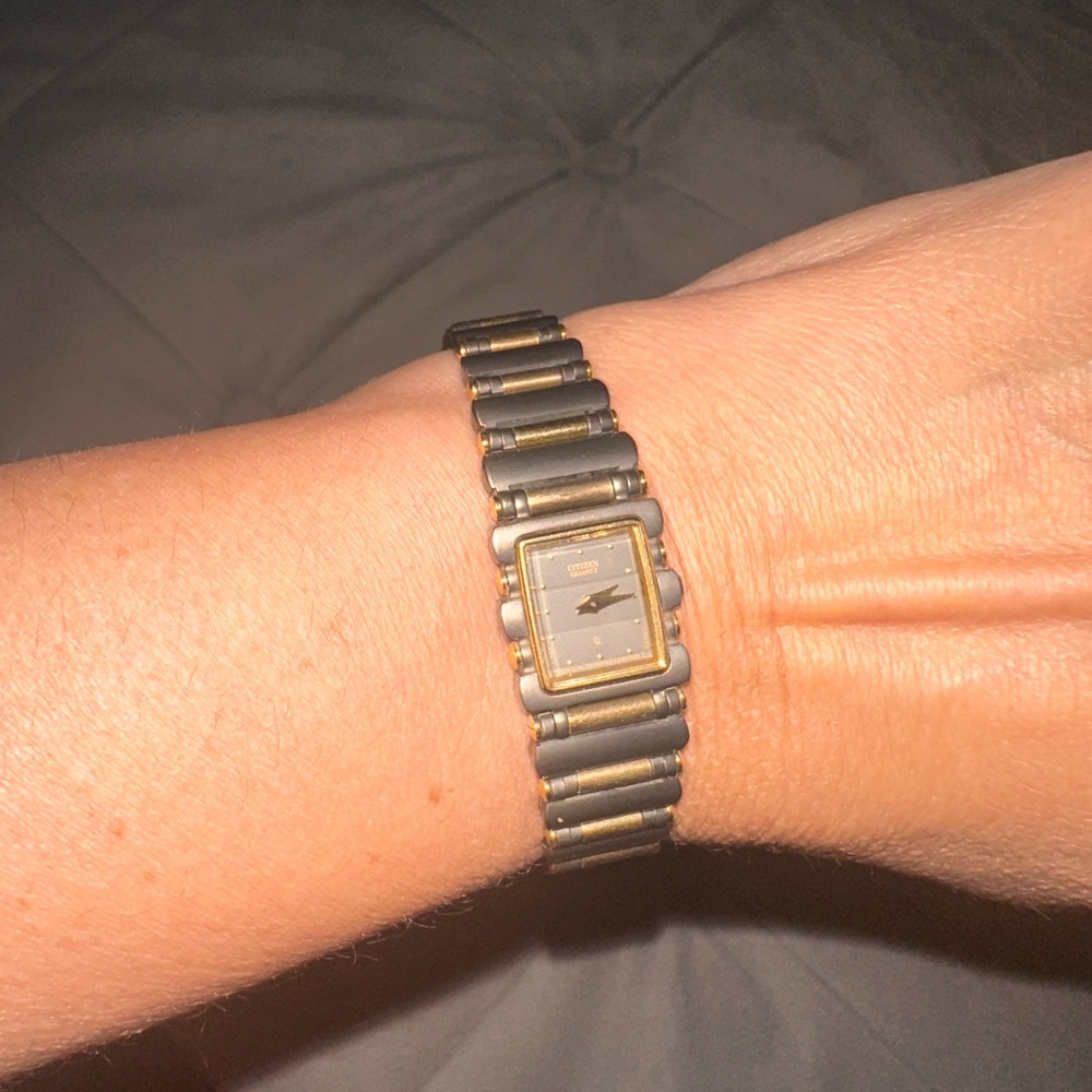 Elegant Black and Gold Watch